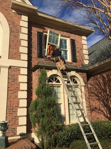 Here's Jeremy installing the Pella Window.