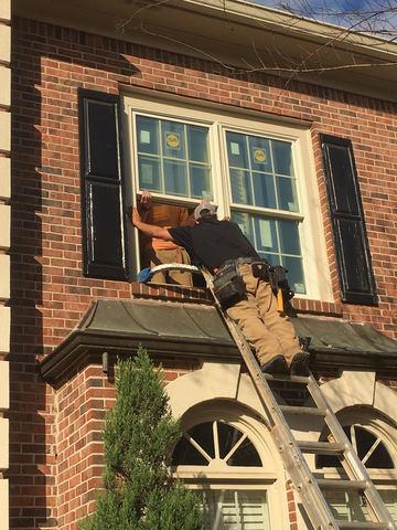 The crew is in the process of installing both windows.