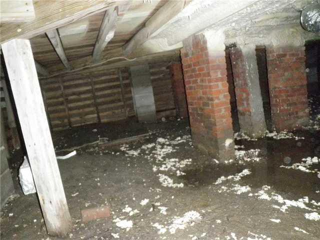 <p>This crawl space flooded during a hurricane. It had a moldy smell emanating from the crawl space.</p>