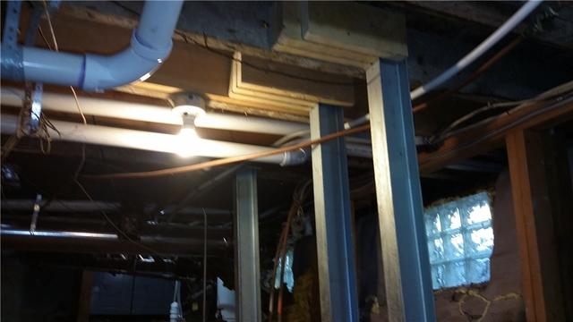 Steel Beams Reinforce Support Joists