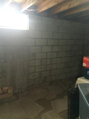 Bowing Wall with Water Damage