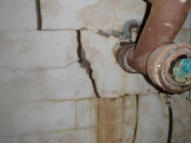 Wall cracks around a main sewer line