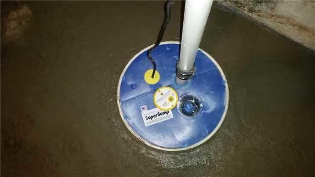 This is a close up of a SuperSump pump that DryZone installed for the Millington, MD homeowners.