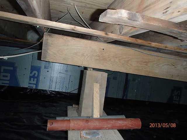 Tiny piece of wood holding up the house