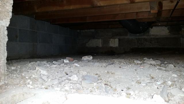 Gravel and Dirt in a Crawlspace