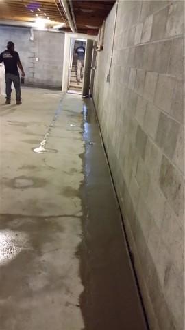 This is what that same stretch of floor looks like once the concrete is poured - good as new.