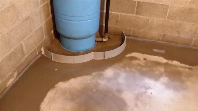 Sometimes water doesn't come from outside - sometimes it comes from an overflowing water heater or other appliance. In that case, we can use a Flood Ring to keep the water contained and direct it right back to the WaterGuard.