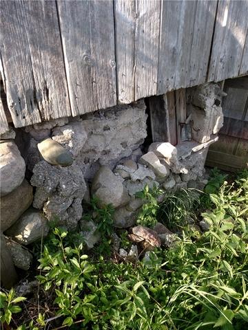 Dilapidated Wall in Barn Foundation