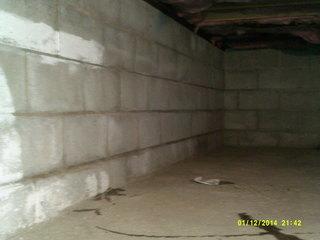 This photos shows an area with a cronic water problem which has been collecting in the corner of this Greenwich basement. Cooincidentally it also happened to be the low point of the basement making it an ideal location for the sump pump to be installed.