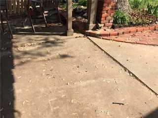 This driveway had settled nearly 1 inch due to the weight of a storage unit resting on the driveway.