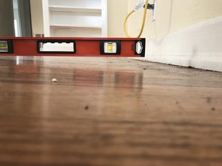 The floor overhang on this home had sunk about 1 and a half inch.