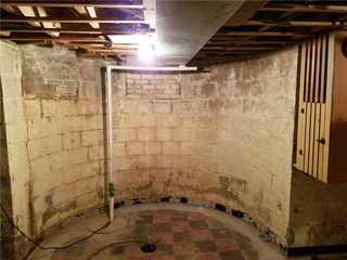 Bowed block walls cause possible great structural damage and needs to be fixed immediately.