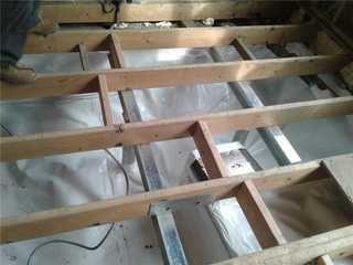 Aerial view of the crawl space before the floors were installed.