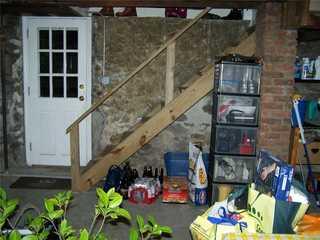 Before, this basement was uninviting and mostly used for storage. The homeowners took the responsible first step by making sure their basement was waterproofed. Now that they are happy with their dry basement, it was time for a transformation.