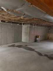 It is always important to make sure that your basement is dry before finishing your basement. Luckily, this homeowner waterproofed her basement first before starting her finishing project.