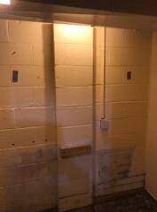 The walls of this basement were bowing and cracking.