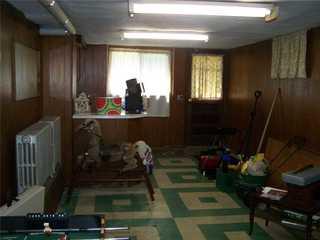 This is what the basement originally looked like. It was not the most inviting nor comfortable place to be in. The homeowner was eager for a transformation.
