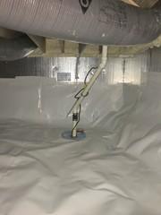 The CleanSpace Liner is the bright white plastic liner you can see on the floor and walls.  The shiny SilverGlo Insulation helps to keep the floors warmer in the winter, and the SmartSump will keep the CleanSpace liner safe from water leaks.