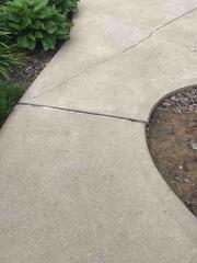 Here you can see how the slab has sunk down a little bit. This could possibly be a tripping hazard.