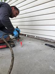 Jay working on making the entire length of the Patio level with the house