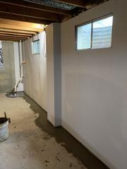 The WaterGuard Basement Waterproofing System is used to intercept the water that seeps into the basement under the floors and down the walls.