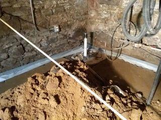 filling in basement after sump pump was installed in the corner