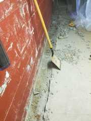 To install out WaterGuard product we must dig a trench and place it against the side walls. This allows the water that reaches the block wall and travels down it to be collected.
