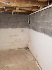 The wall on the right was a problematic wall for the homeowner as it let water seep in after rains. The corner it runs into also posed a great spot to install our sump pump system.