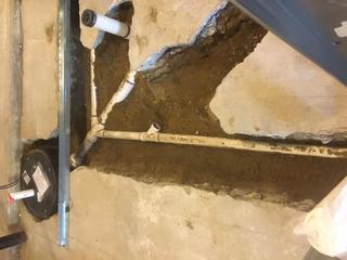 Before our TBF crew was able to to begin installing walls and floors, they needed to make sure the foundation was in good shape so it would not have to fixed at a later date. There were cracks around these drainage lines which was replaced by new concrete by our crew.