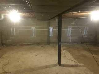 Installing GeoLock Anchors in Kennett, MO Basement