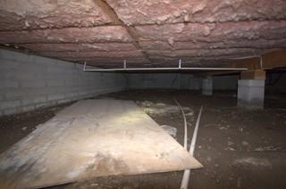 A look at the crawl space before the crew installed the CleanSpace® vapor barrier.