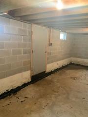 This dirty basement needed to be waterproofed badly.