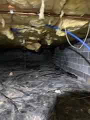 This dirty crawlspace is unusable.