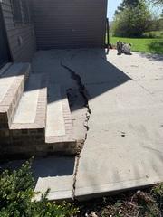 The back patio became a trip hazard with 2 inches of settlement.