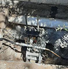 After installing the foundation support pier, but before we have back filled the area.