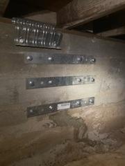 A foundation hole was repaired by using foundation straps and anchor.