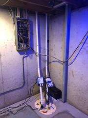 Water Seeping Through Cracks in Foundation Repaired with PowerBrace and Waterguard in Ballwin, MO