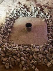 Each SmartJack has a "Bulb of Influence" which is a hole that is dug and filled with concrete or gravel. Doing this distributes the pressure caused by the weight of the home to be more distributed to prevent the sinking of the SmartJack.