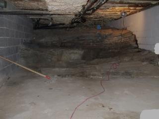Before installing the Cleanspace our team removed all debris and cleaned the rock ledge.
