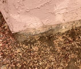 Flaking paint is a common symptom of corrosion in stem walls. Corrosion not only damages the concrete and the metal components of the stem wall but also affects the paint.