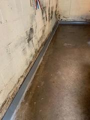 Our WaterGuard French Drain Channel is installed above the footing of the home's foundation, so it will never rust nor corrode. It will help keep the basement dry and healthy all year round.