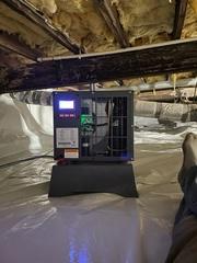 This Sanidry dehumidifier is helping decrease the high moister levels in this crawlspace.