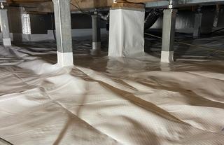 This homeowner has owned this home for over 50 years and finally decided it was time to take care of their sagging foundation and encapsulate their two crawlspaces to keep their home clean and more efficient.