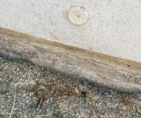 Every crack has a different meaning or even a reason when they show up. In this case, a horizontal concrete crack means that the corrosion problem started in the rebar and then spread to the rest of the stem wall elements.