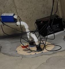 WaterGuard and UltraSump Catch Water Leaking in Corner of Creve Coeur, MO Basement