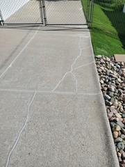 NexusPro is used here to fill in the cracks and joints through the concrete. This is waterproof, so it helps prevent water from getting through and under the slabs.