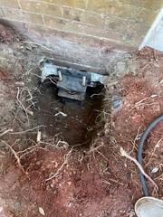These steel piers will transfer the weight of the structure to the strong soils below.