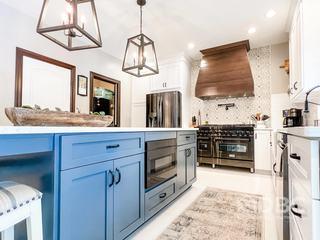 Farmhouse With Modern Features Kitchen Remodel in Erie, PA by DBC Remodeling & Construction project photo 16