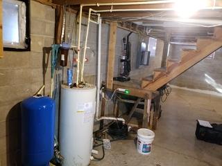 Old sump pump causing water to seep in.