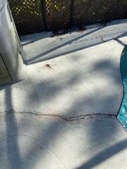 This home had significant damage around the pool deck, as well as inside and outside the home. It was experiencing severe settlement.